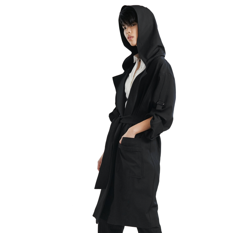 Photo of a model wearing the Bleach resistant LV1 Studio Trench Cloak Coat for hairstylists and salon professionals. 